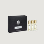 Crespo Aventus perfume set with three small bottles and a black box on a light gray background