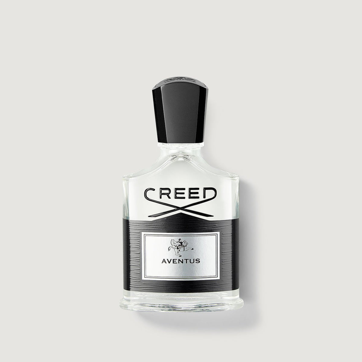 Creed Aventus perfume bottle on a light gray background