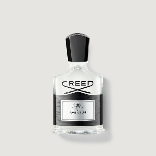 Creed Aventus perfume bottle on a light gray background
