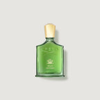 Green Creed Wild Vetiver perfume bottle on a light gray background