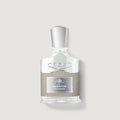 Creed Aventus cologne bottle on a light gray background