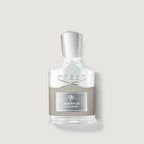 Creed Aventus cologne bottle on a light gray background
