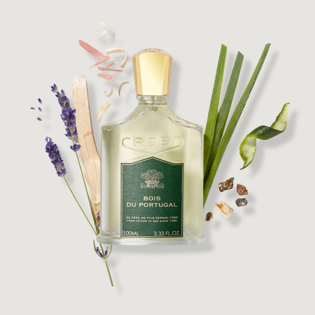 Bois du Portugal perfume bottle with botanical elements on a light background