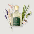 Bois du Portugal perfume bottle with botanical elements on a light background