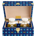 Holiday Trunk Rue Royal close up of the opened trunk with 2 250ml bottles inside and atomizer