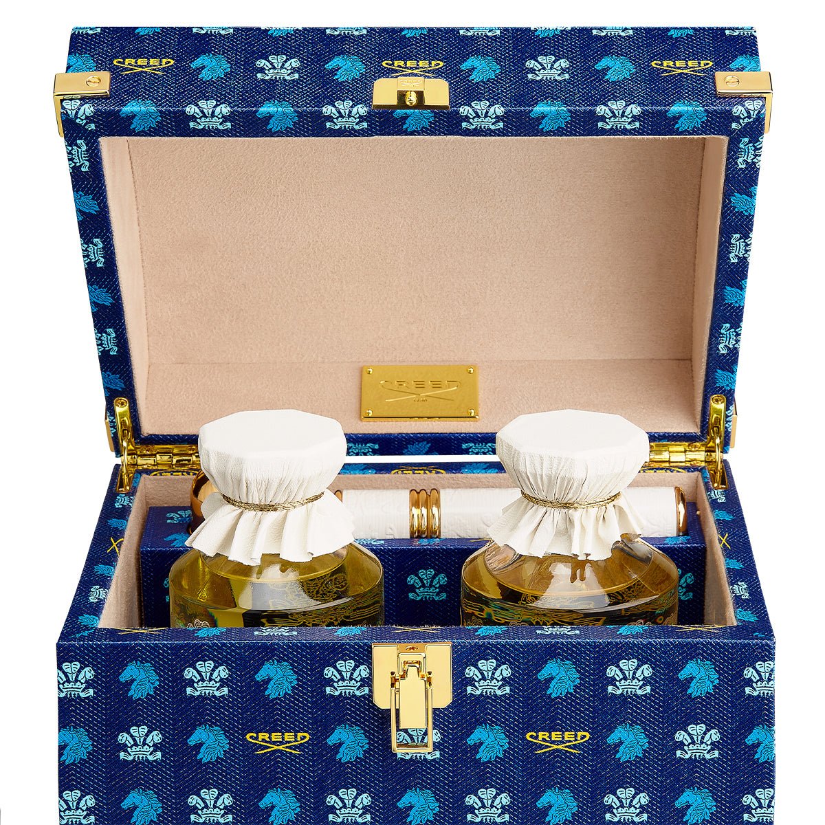 Holiday Trunk Rue Royal close up of the opened trunk with 2 250ml bottles inside and atomizer