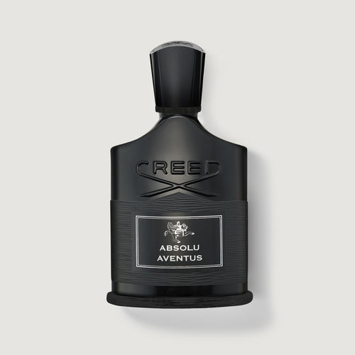 Black Creed Absolu Aventus perfume bottle on a light gray background