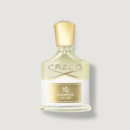 Creed Aventus for Her perfume bottle on a light gray background