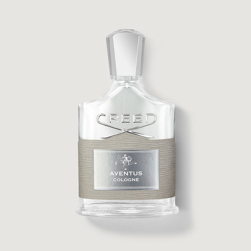 Creed Aventus cologne bottle on a light gray background